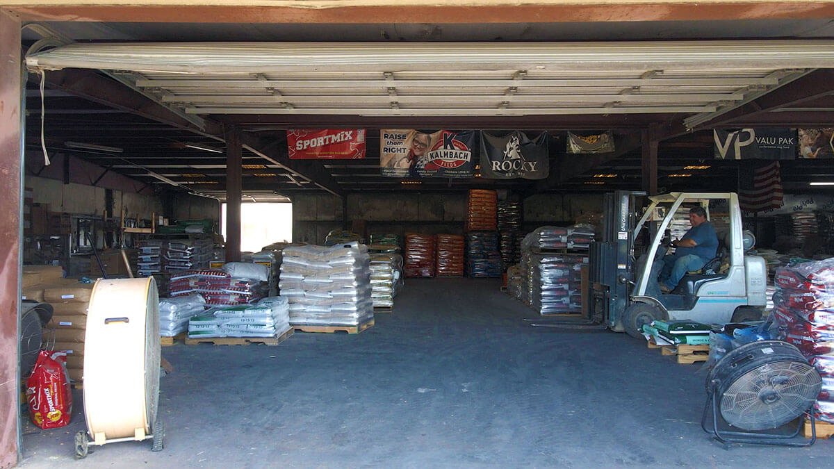 Pallets of feed and seed in the Hi Grade warehouse